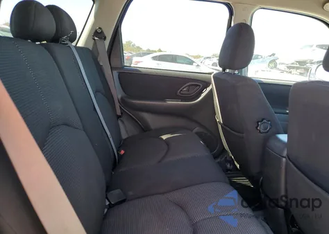 2006 Mazda Tribute S z USA, uszkodzony, nr VIN 4F2YZ94106KM09533